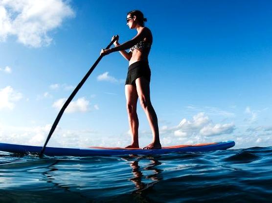 Paddleboarding at Dawn: Relishing the Calm of Sunrise