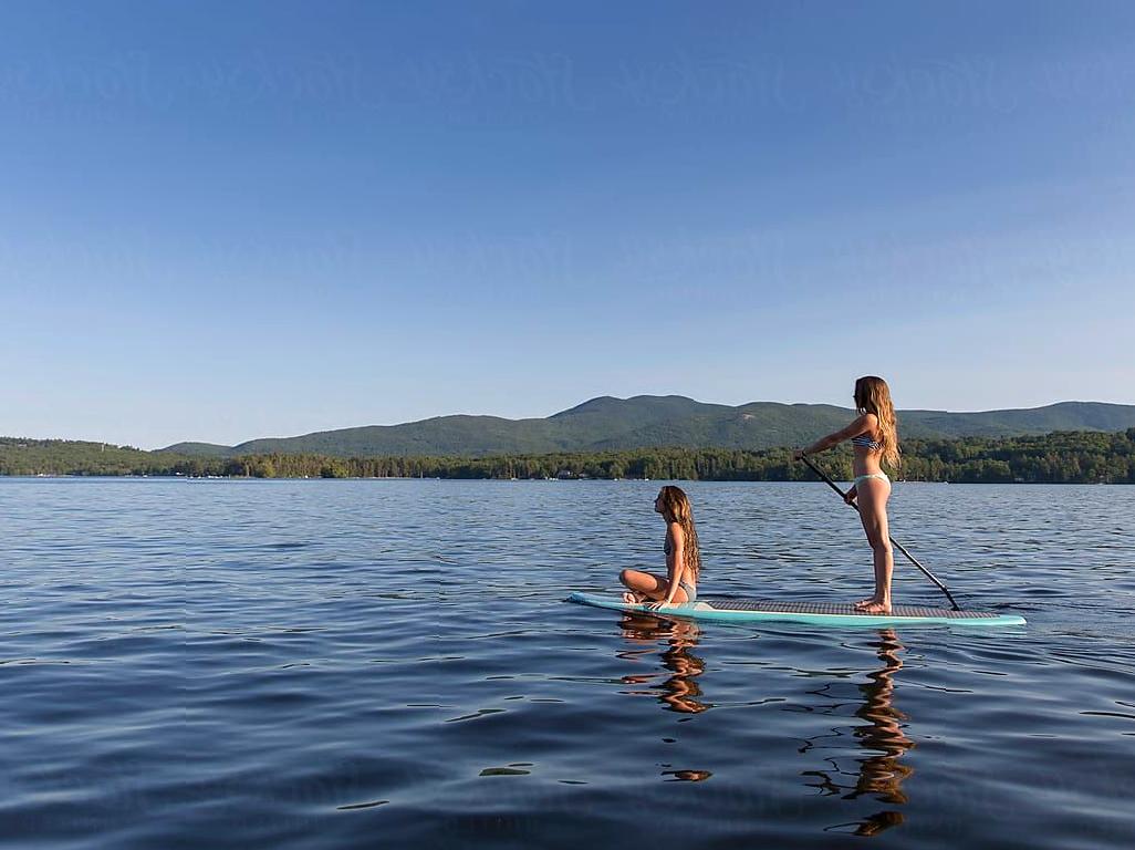 Morning Serenity on the Water: Paddleboarding at Sunrise